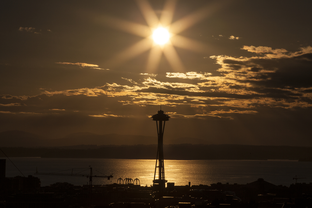 500px Photo ID: 123171511 - The sun on it's way down right over the Space Needle in Seattle, Washington.